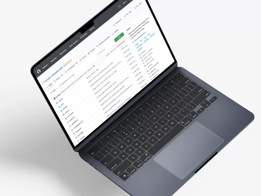 Laptop displaying a software interface, possibly related to SkyWater Technology's mixed-signal CMOS processes, with a focus on design files and project management.